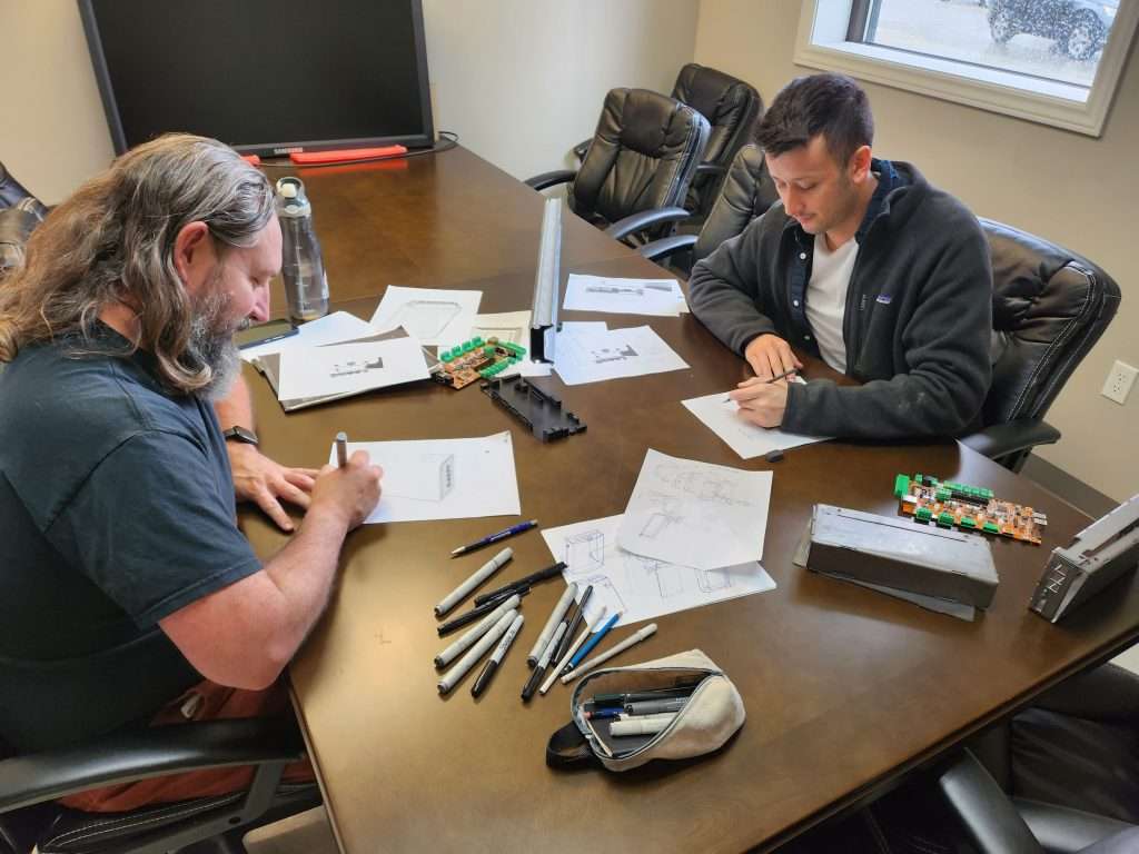 dan-and-Jason-working-on-control-board-case | Sienci Labs